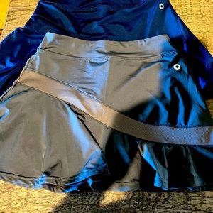 Two Tennis skirts, one grey one blue